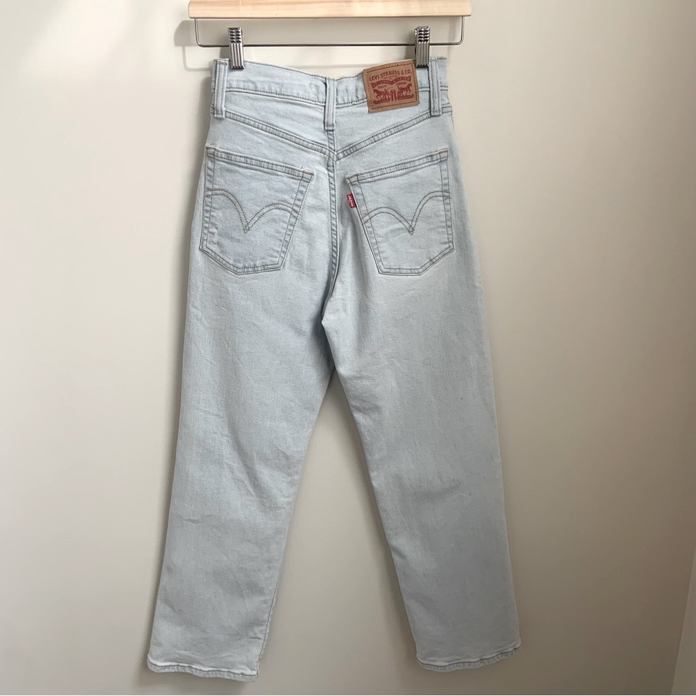 Levi’s, light wash ribcage straight ankle size 25